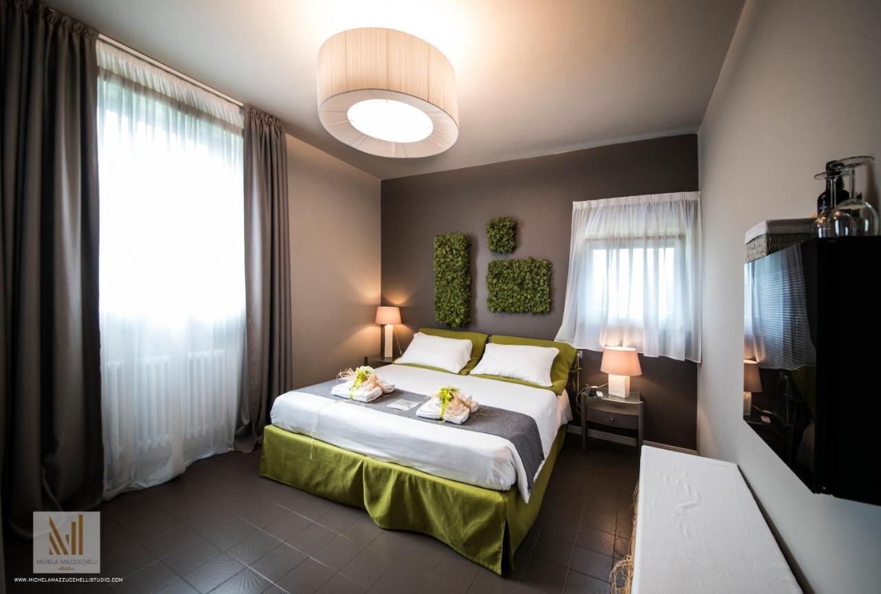 Art B&B Design Costa Volpino Kültér fotó