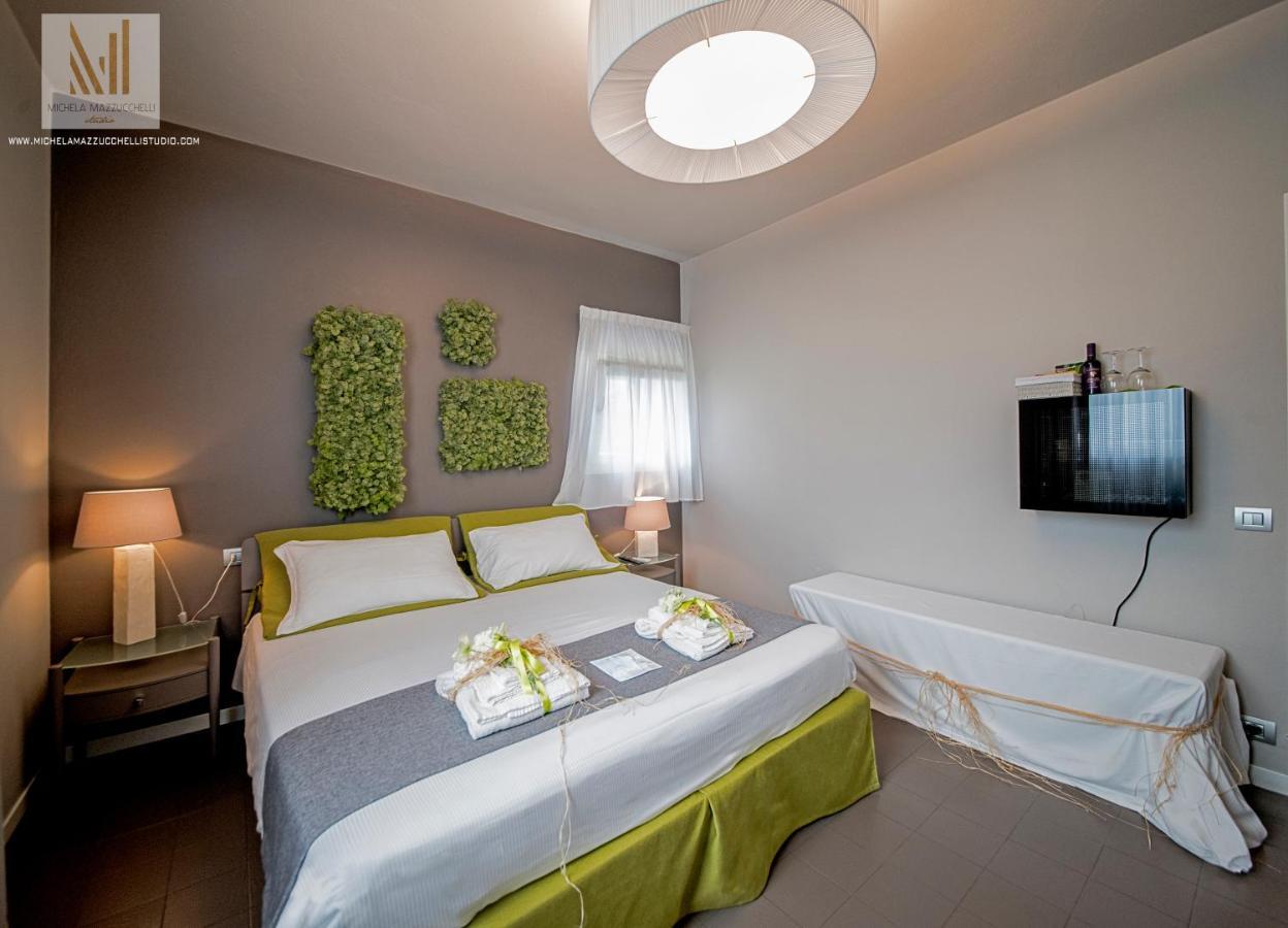 Art B&B Design Costa Volpino Kültér fotó