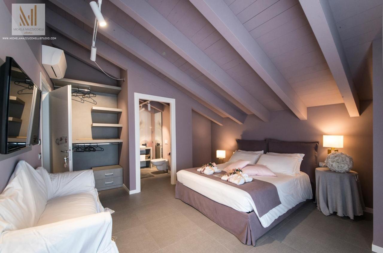 Art B&B Design Costa Volpino Kültér fotó