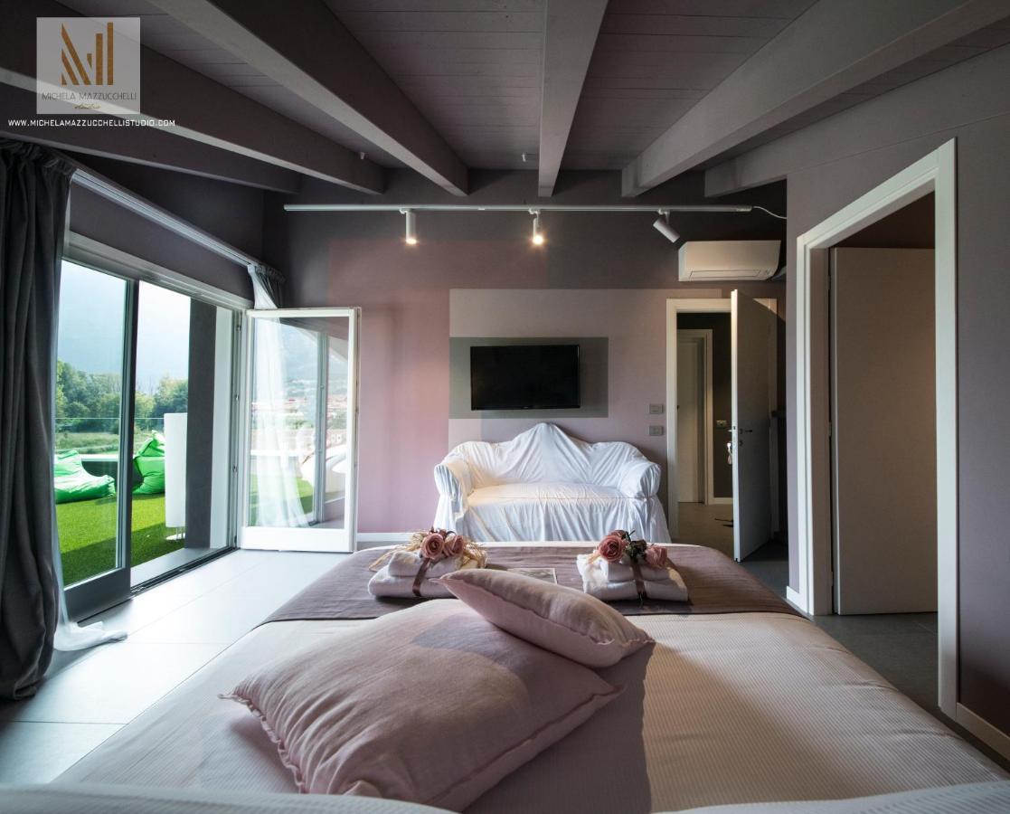 Art B&B Design Costa Volpino Kültér fotó